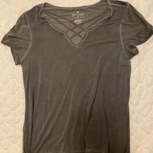 Grey shirt with strappy neckline